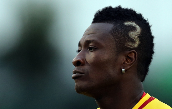 Ghana's captain Asamoah Gyan during their training at the team hotel in Nelspruit, South Africa, Tuesday Feb. 5, 2013. Ghana will play their African Cup of Nations semifinal soccer match against Burkina Faso on Wednesday Feb. 6, 2013. (AP Photo/Themba Hadebe)